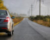 Wisatawan menikmati one day trip Medan menggunakan mobil rental.